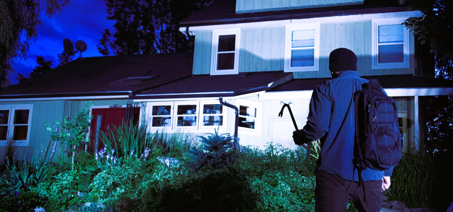 robber on the background of the house