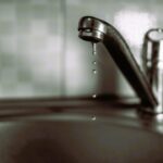 Water is dripping from tap