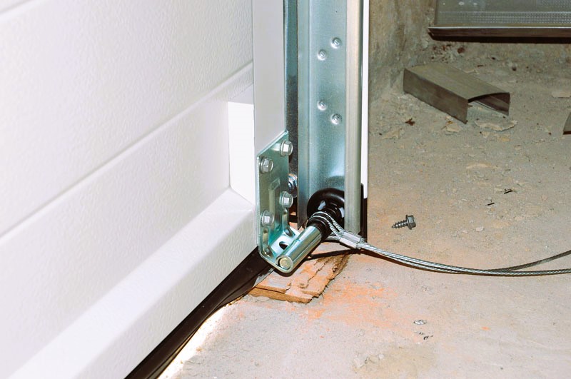Close up on Installing Garage Door.